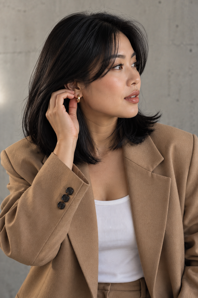 Curtain bangs with shoulder length hair, a trendy medium haircut idea